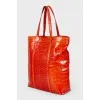 Bright leather bag with reptile embossing