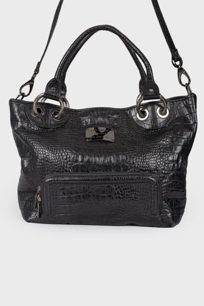 Leather bag with embossing for reptile