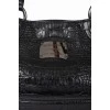 Leather bag with embossing for reptile