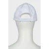 White cap with tag