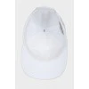 White cap with tag