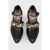 A chain and pearls shoes