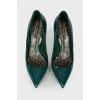 Varnished dark green shoes
