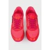 Bright pink sneakers