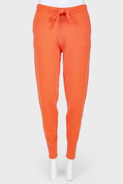 Coral cashmere trousers with tag