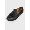 Leather loafers with fringe