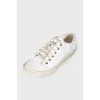White textile sneakers with tag