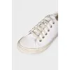 White textile sneakers with tag