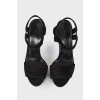 Suede sandals with figured heel