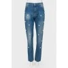 Jeans with pearl effect beads and tag