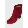 Suede ankle boots with rhinestone heel and tag