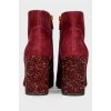 Suede ankle boots with rhinestone heel and tag