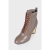 Leather ankle boots with tag