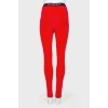 Red trousers with elastic band logo